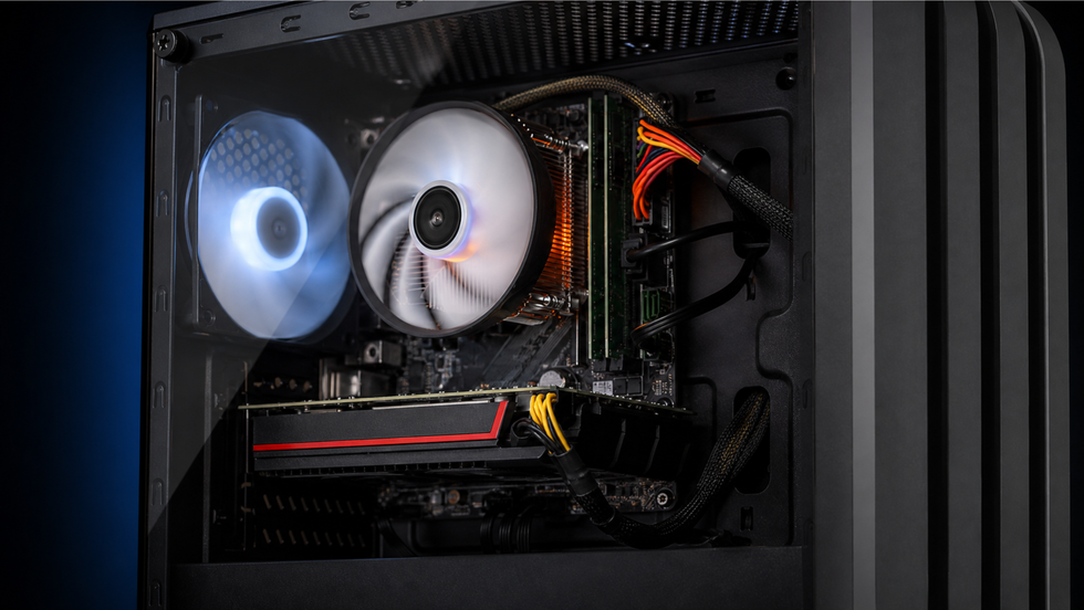Close-up inside the Eclipse V1 gaming PC showing the CPU cooler fan, RX 580 graphics card, and cabling