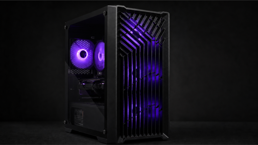 Eclipse V2 matte black gaming PC with purple RGB lighting glowing through its mesh front panel